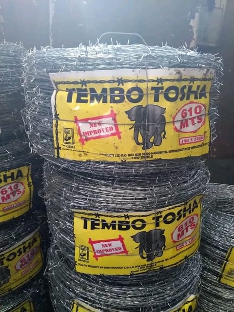 Rolls of barbed wire with yellow TEMBO TOSHA brand labels